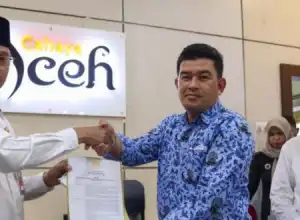 Asisten Setda Aceh Serahkan SK Plt Kadisbudpar dan Plt Kadisnak Aceh
