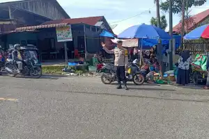 Polisi di Bener Meriah Gelar Patroli Di Pasar Tradisional 