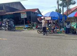 Polisi di Bener Meriah Gelar Patroli Di Pasar Tradisional 