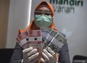 Nilai Tukar Rupiah Terhadap Dolar AS Menguat 0,05 Persen