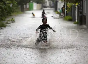 Foto Feature: Banjir Akibat Curah Hujan Tinggi