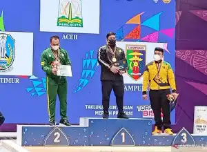 Zul Ilmi, Lifter Aceh Raih Mendali Emas di PON Papua