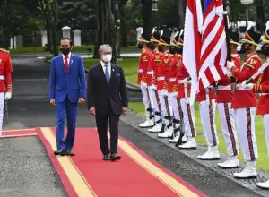 PM Muhyiddin Minta Jokowi Pulangkan TKI Ilegal di Malaysia