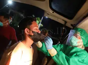 Foto Feature: Rapid Tes Antigen Bagi Pemudik