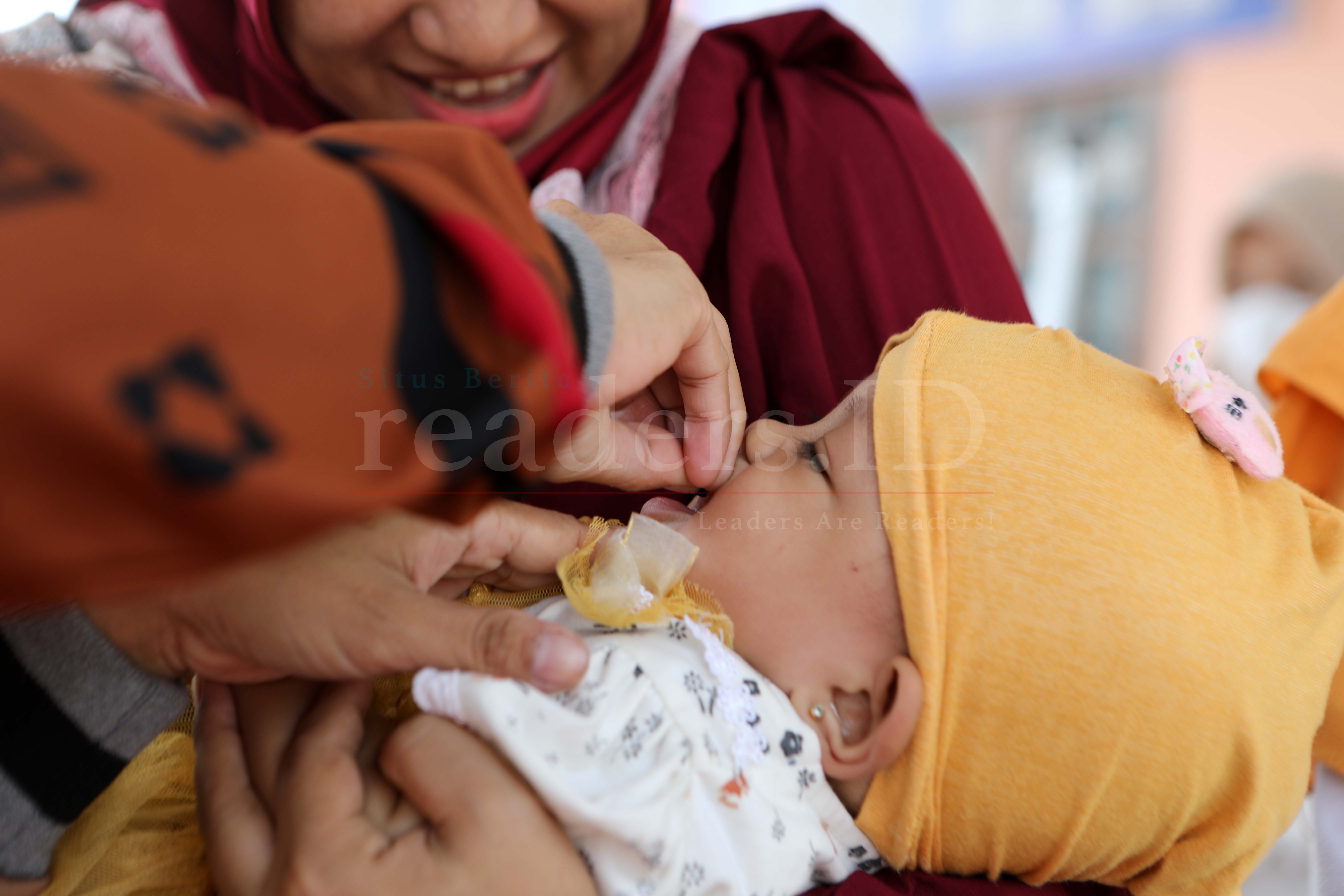Foto Feature: Posyandu Untuk Menekan Penyebaran COVID-19 Pada Anak